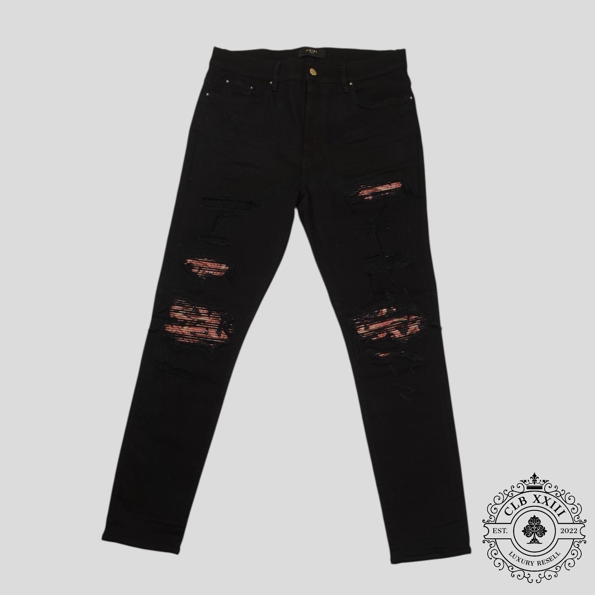 Amiri Banana Leaf Patch Thrasher Jeans in Black
